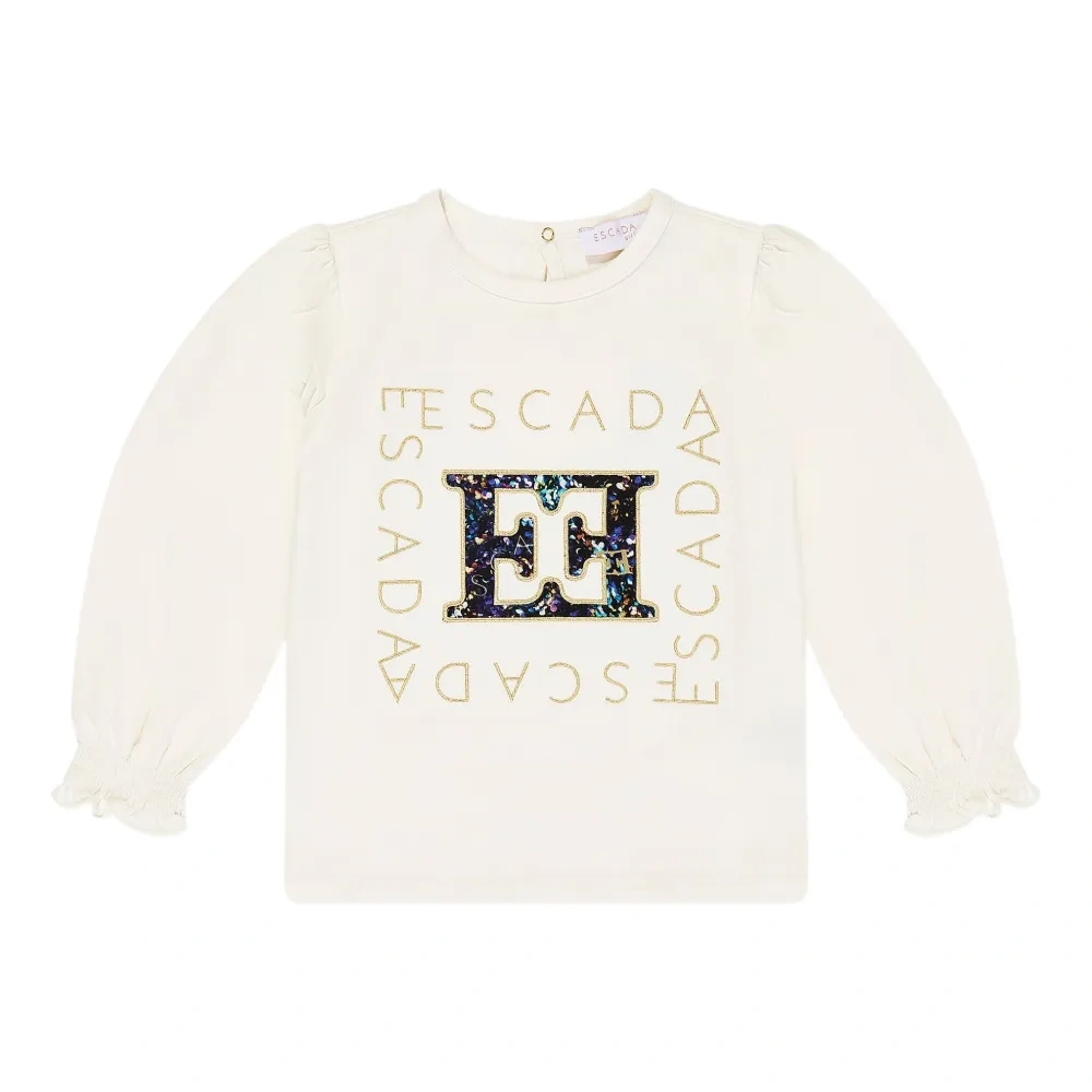 Топ с пайетками и объемными рукавами