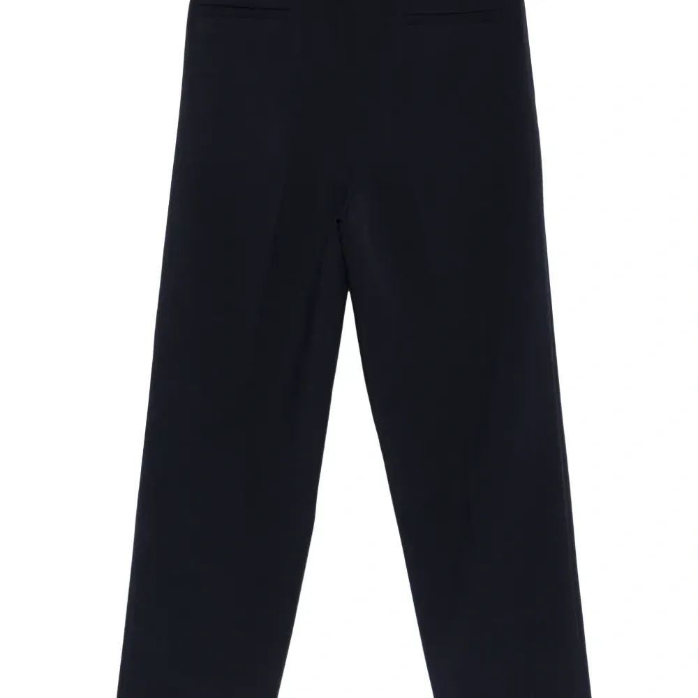 Брюки прямого кроя со складками