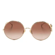 Солнцезащитные очки в круглой оправе