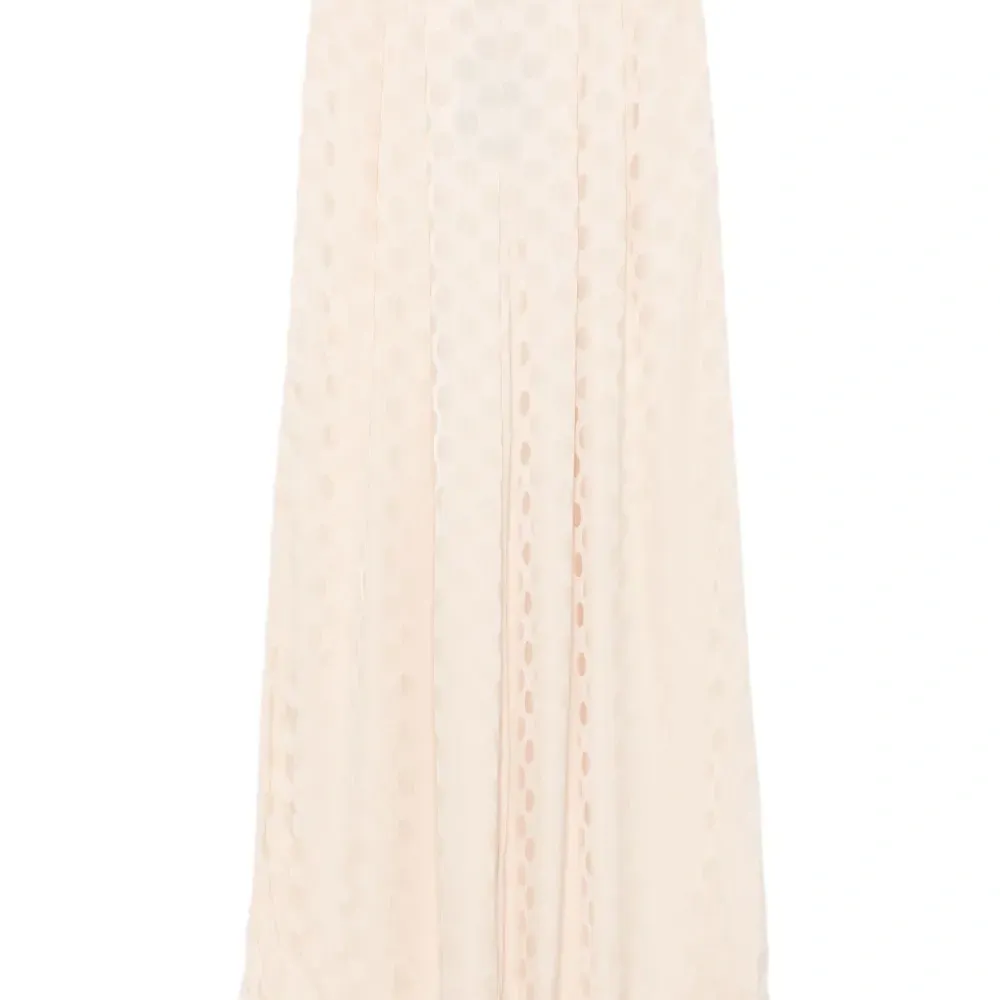 Брюки в горох со складками