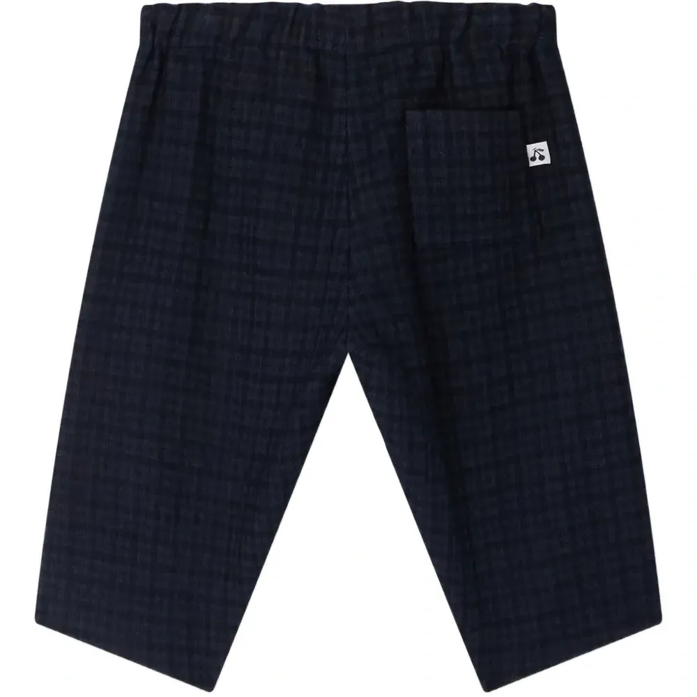 Брюки в клетку