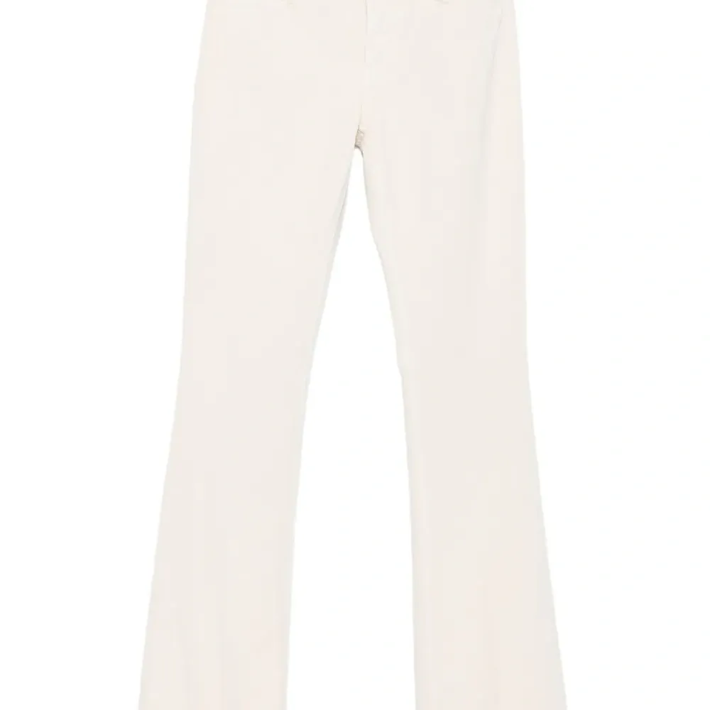 Брюки на пуговицах