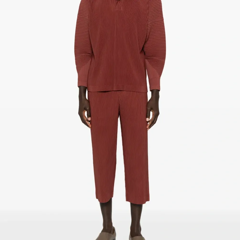 Укороченные брюки со складками Укороченные брюки со складками