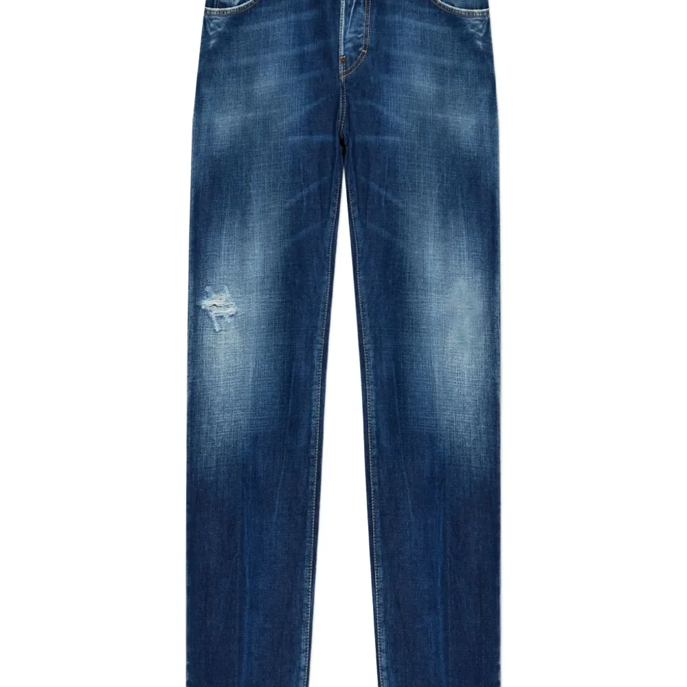 Джинсы из потертого денима