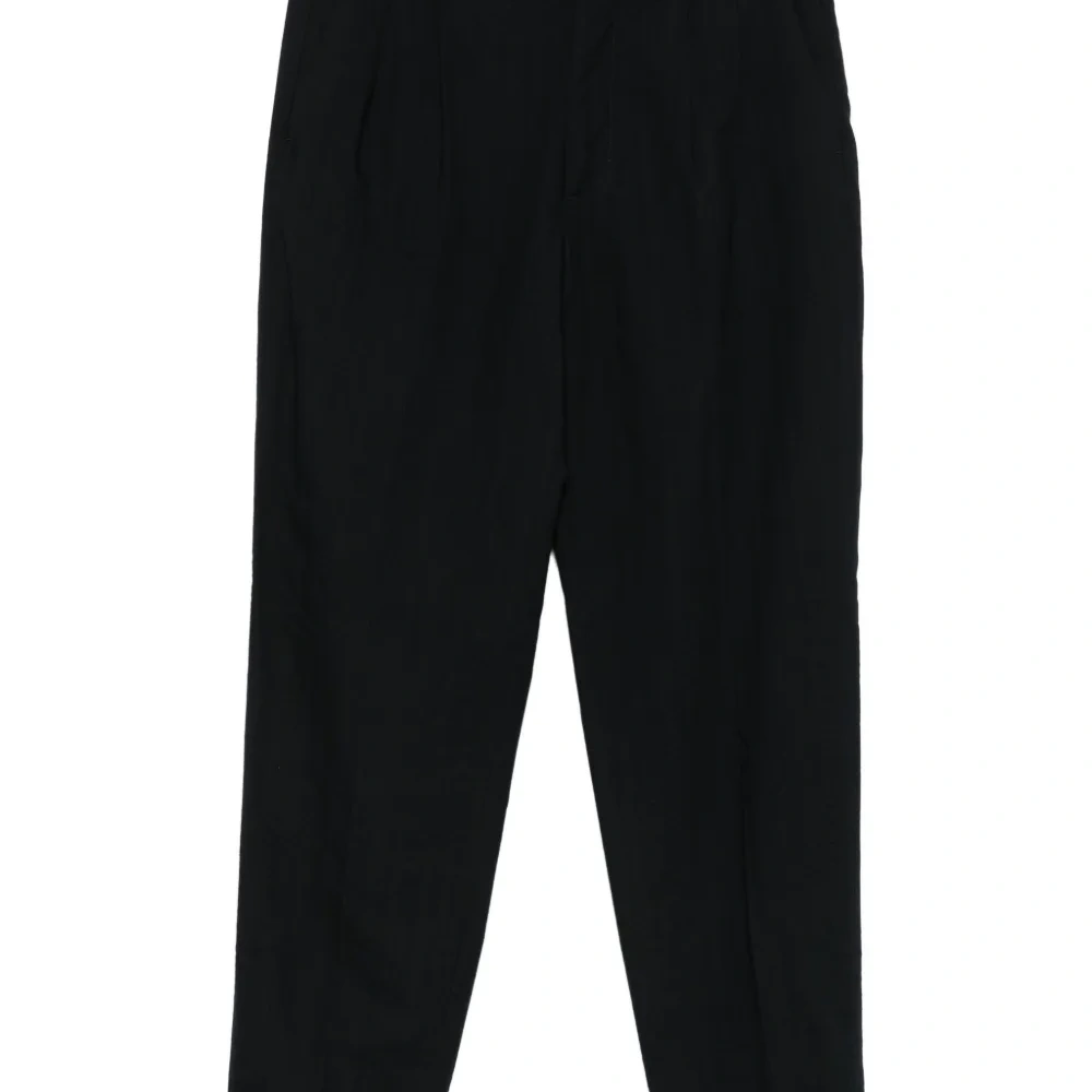 Брюки с защипами и подворотами