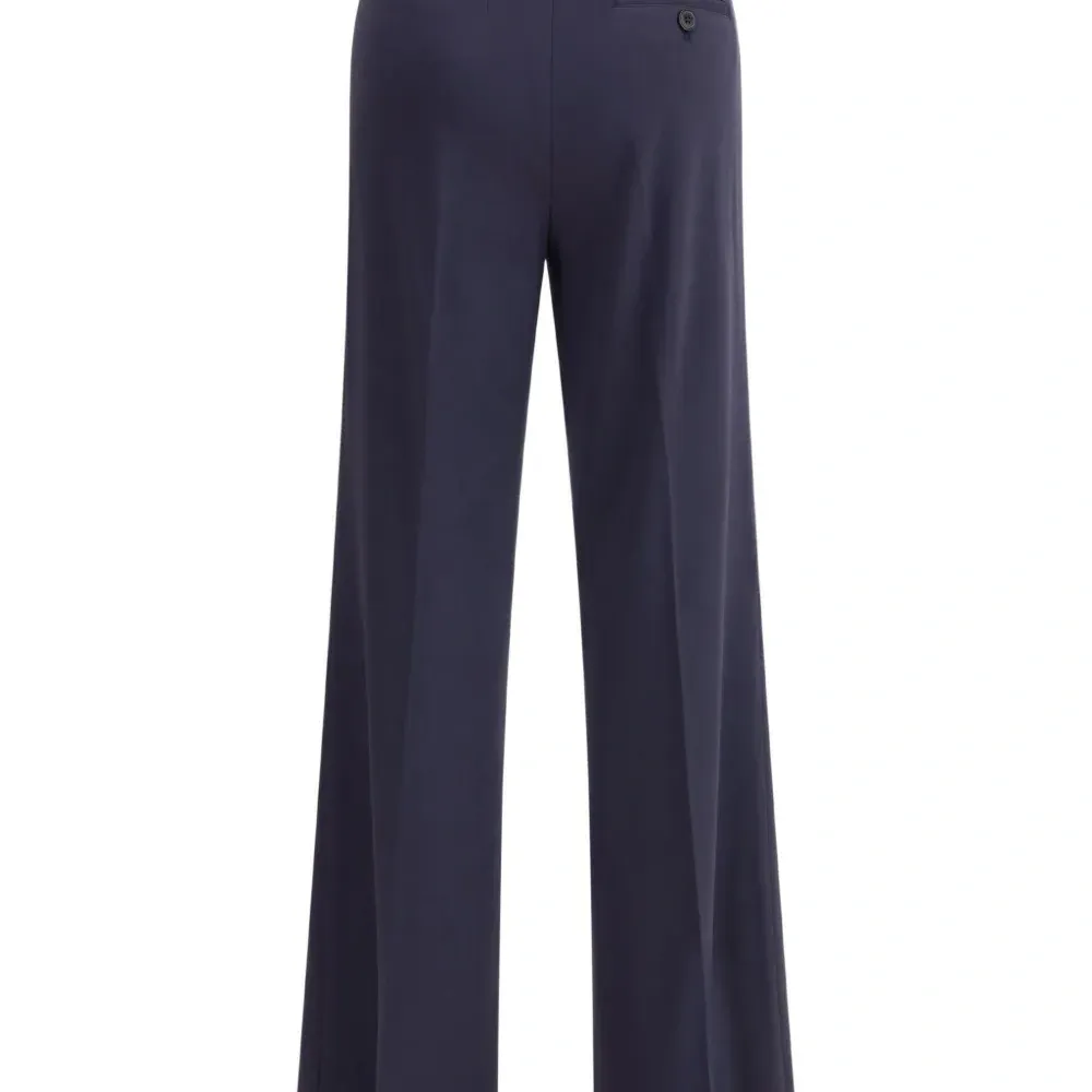 Широкие брюки на пуговицах