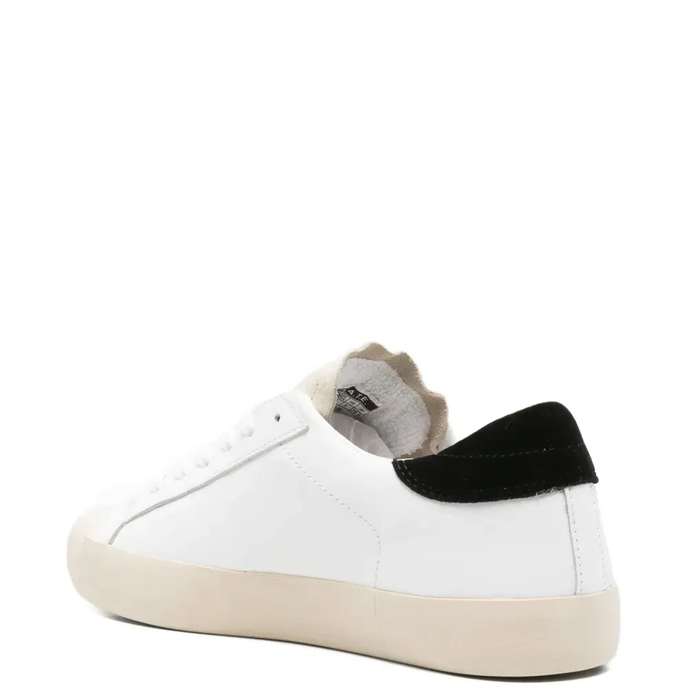 Кожаные низкие кеды на шнуровке