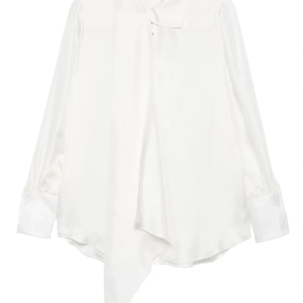 Блузка асимметричного кроя