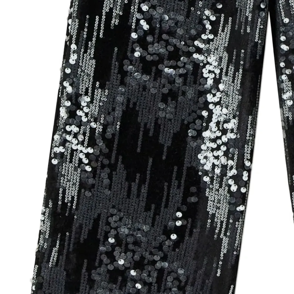 Вельветовые брюки, украшенные пайетками