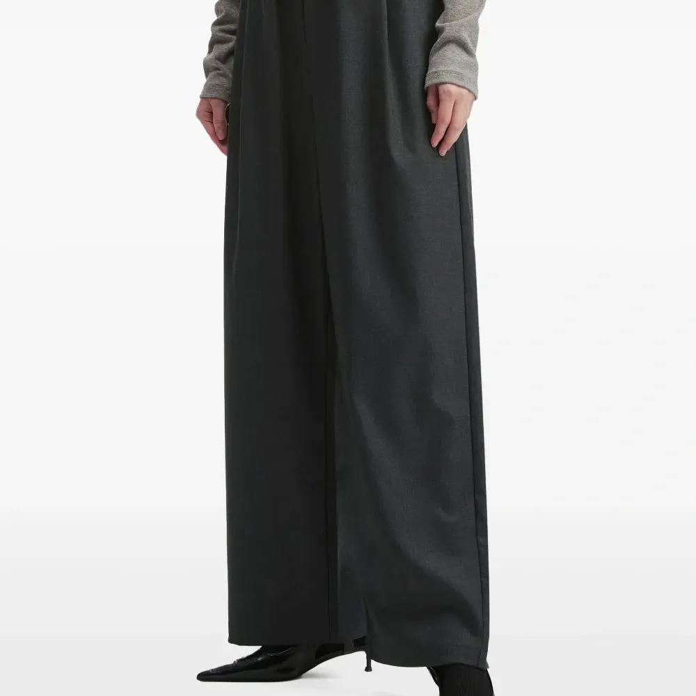 Брюки со складками