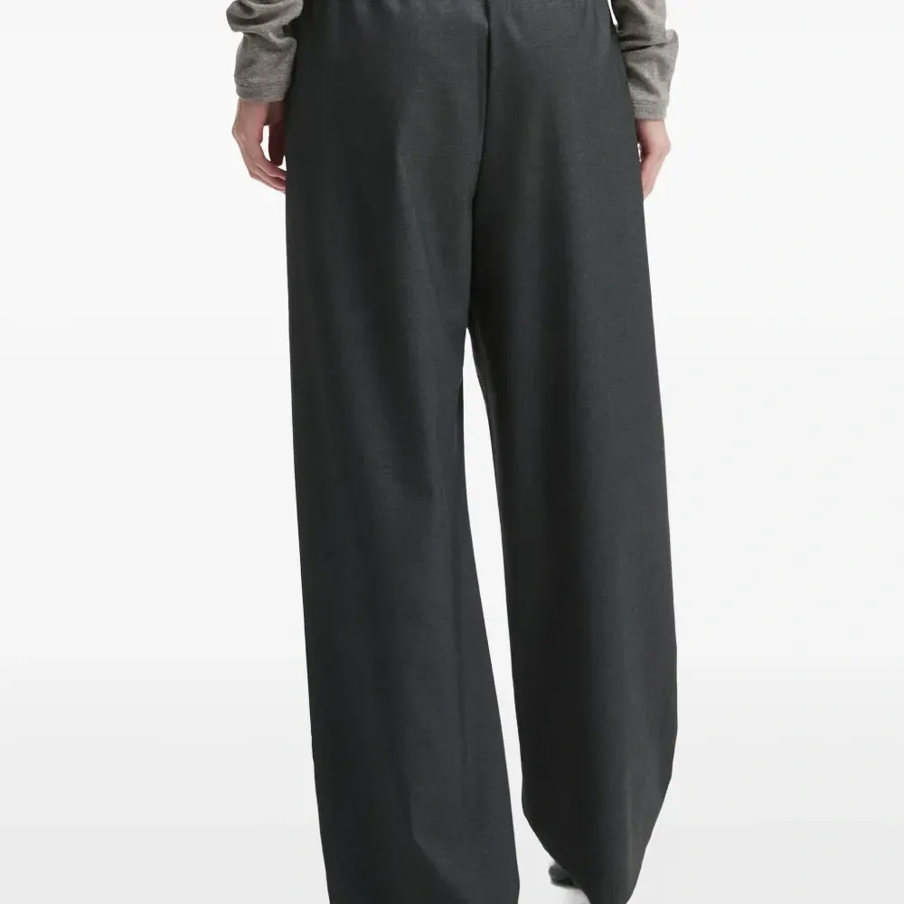 Брюки со складками