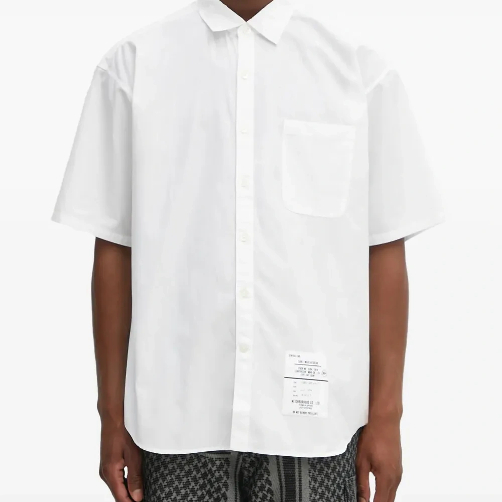 Рубашка с нашивкой на кармане