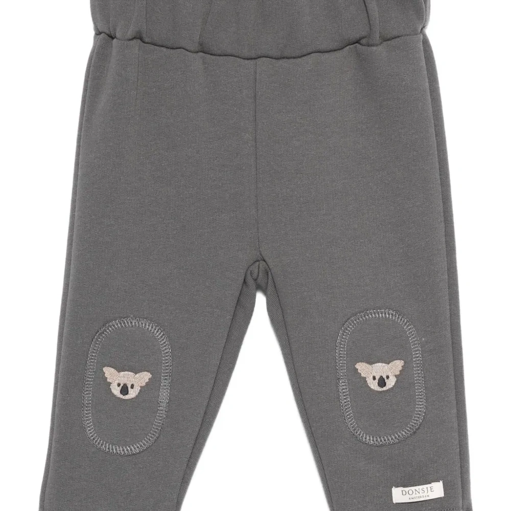 Брюки с вышивкой в виде коалы