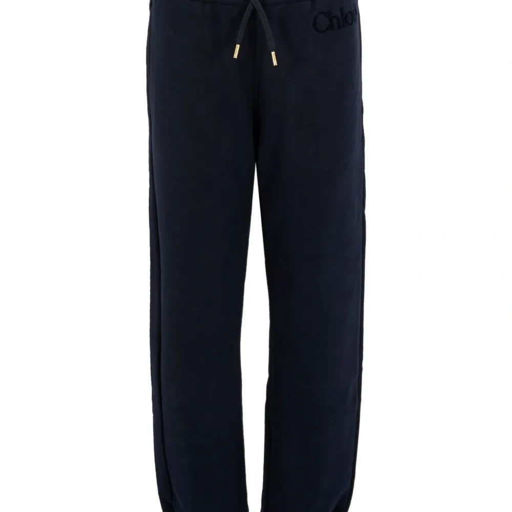 Брюки с манжетами и вышитым логотипом