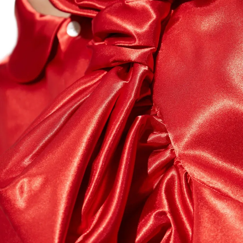 Блузка с бантом