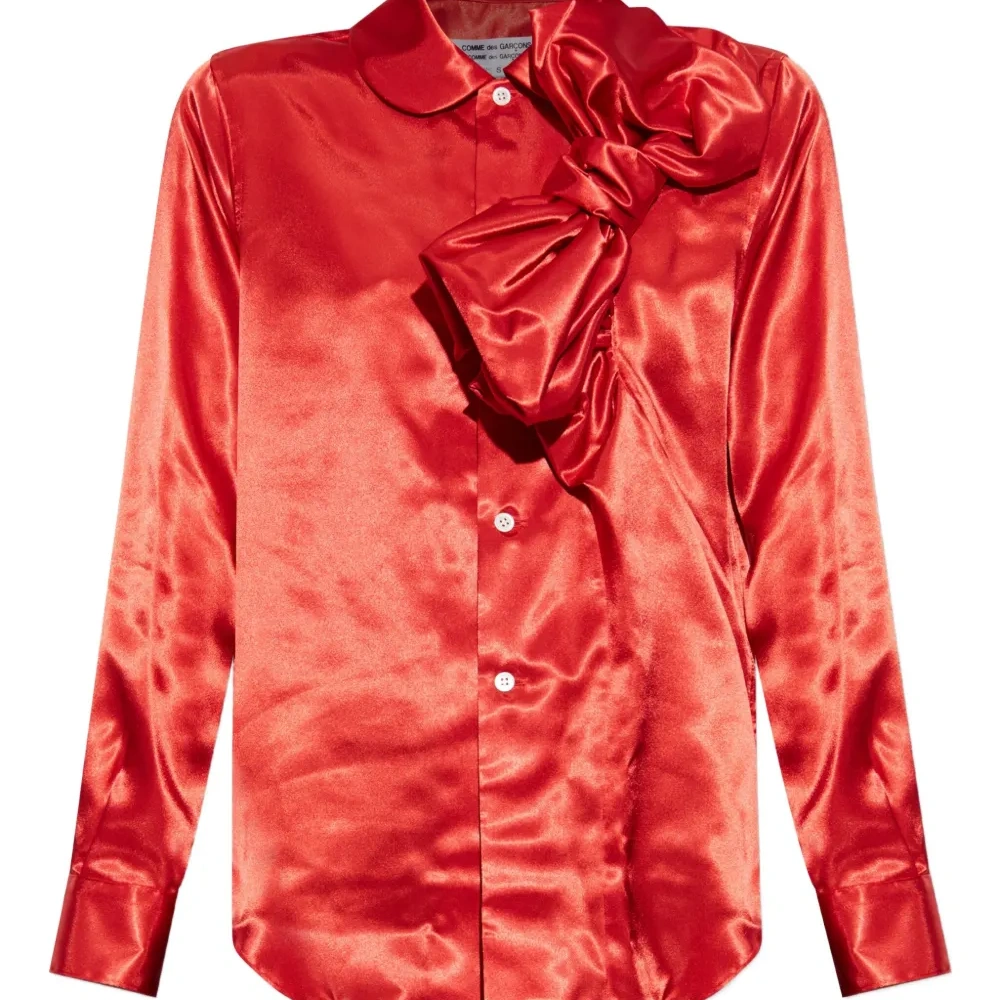 Блузка с бантом