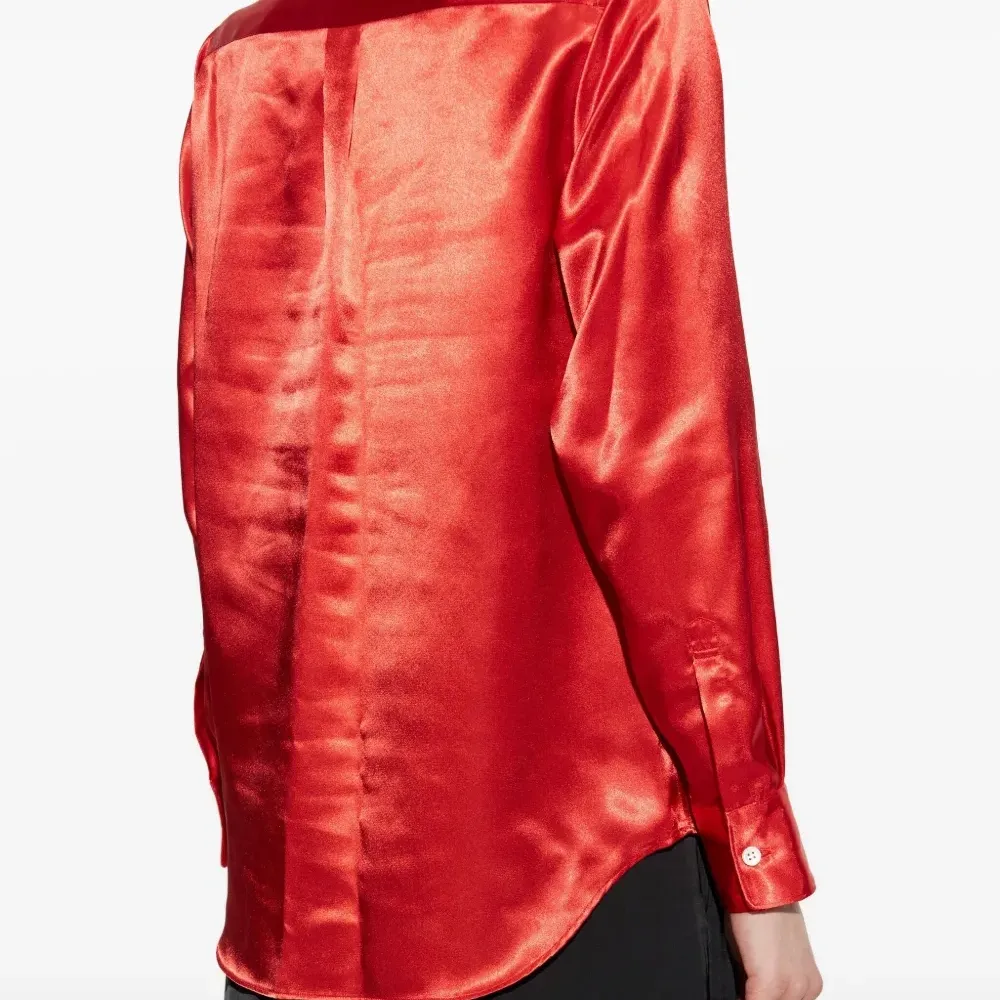 Блузка с бантом