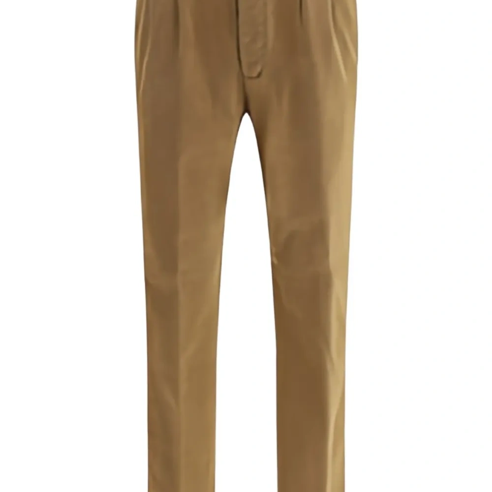 Брюки со складками спереди