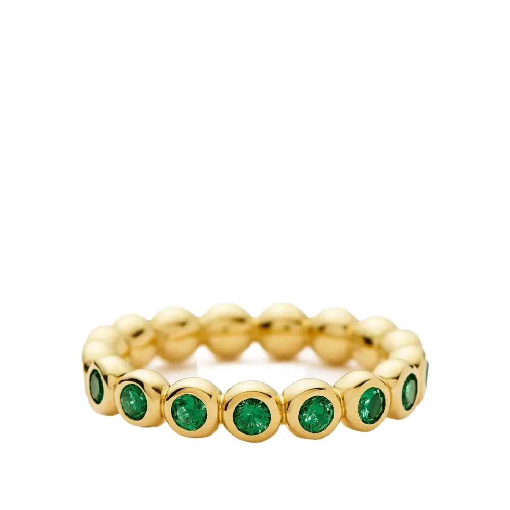 Позолоченное кольцо с изумрудами