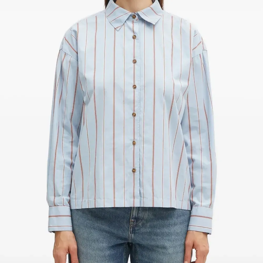 Полосатый топ на пуговицах