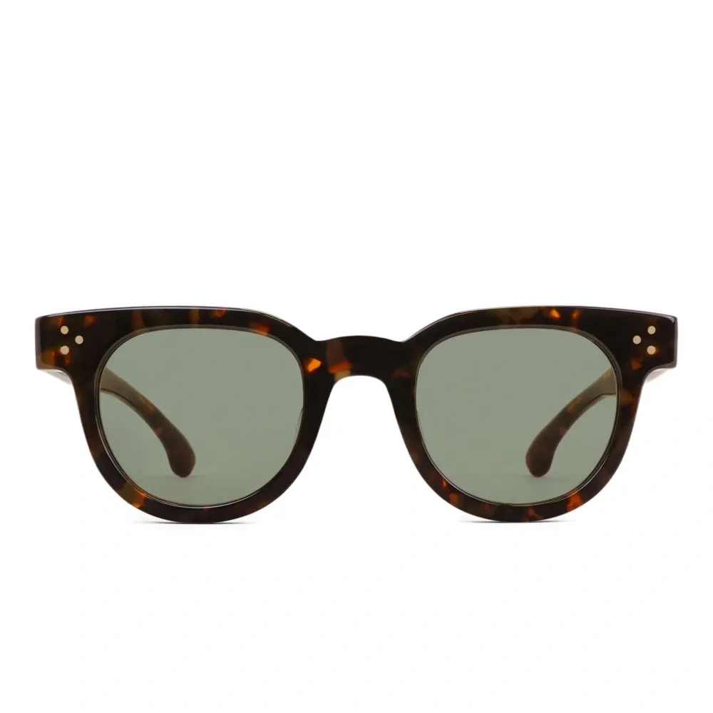 Солнцезащитные очки в круглой оправе черепаховой расцветки