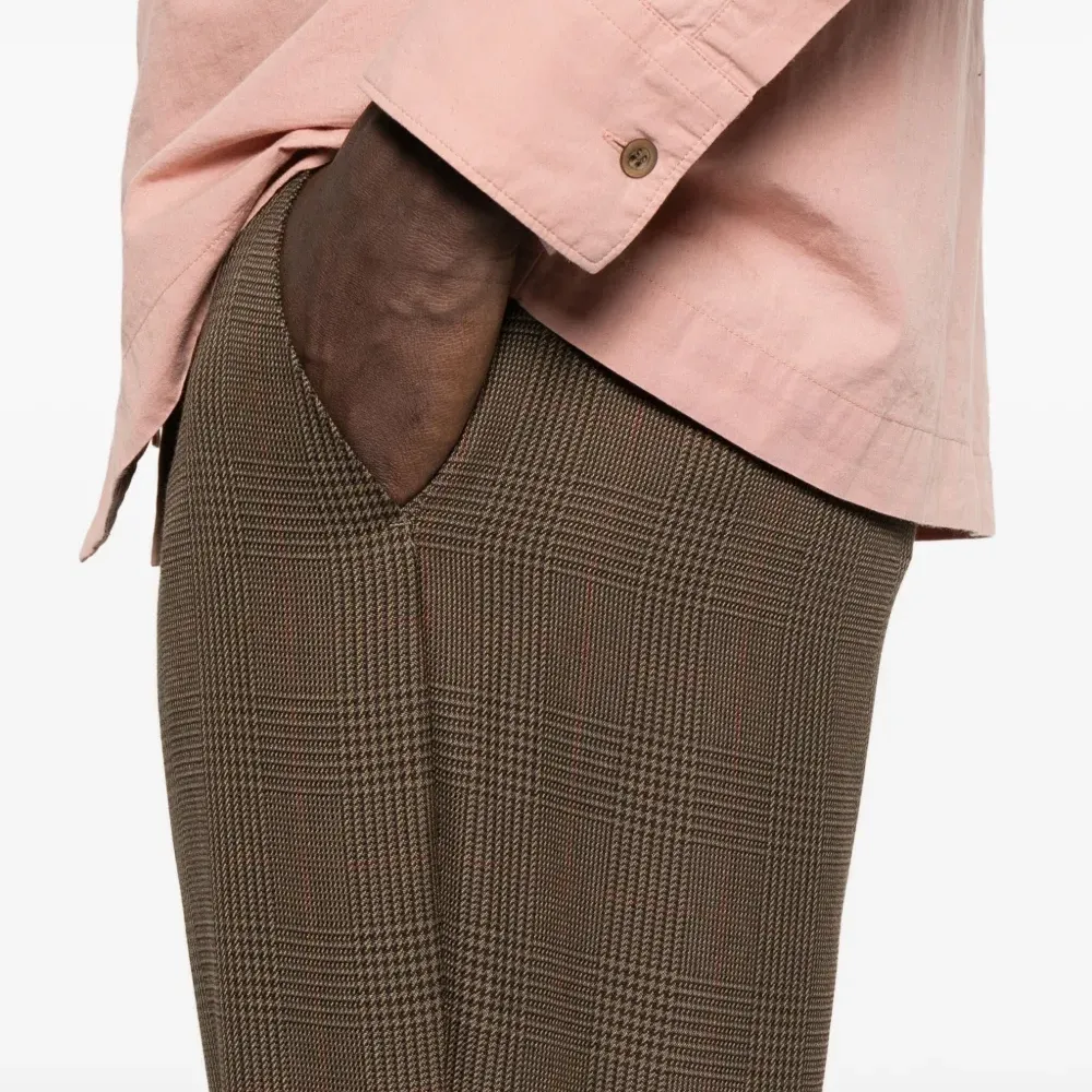 Брюки в ломаную клетку Брюки в ломаную клетку