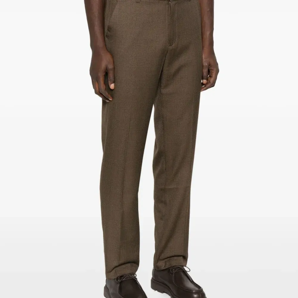 Брюки в ломаную клетку Брюки в ломаную клетку