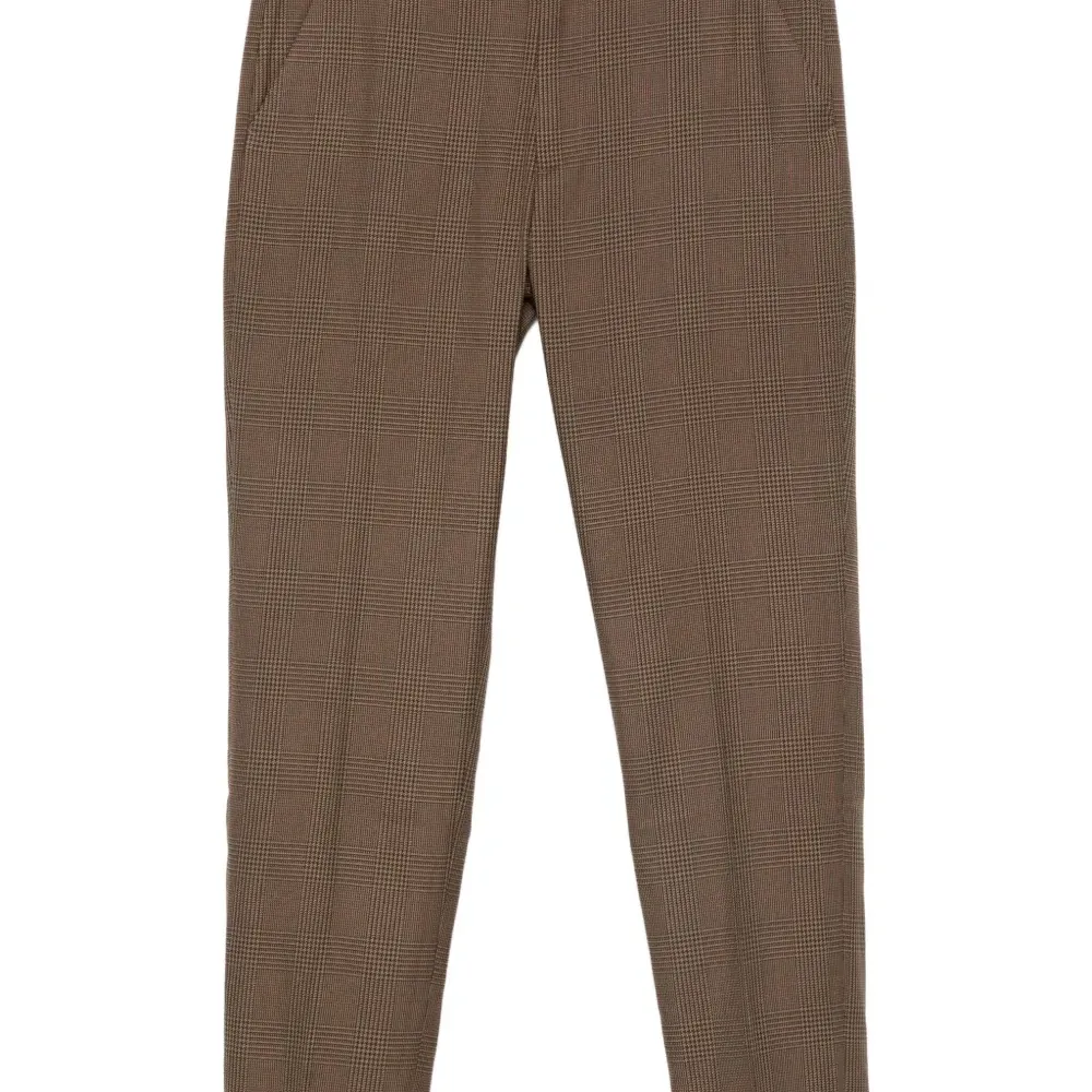 Брюки в ломаную клетку Брюки в ломаную клетку