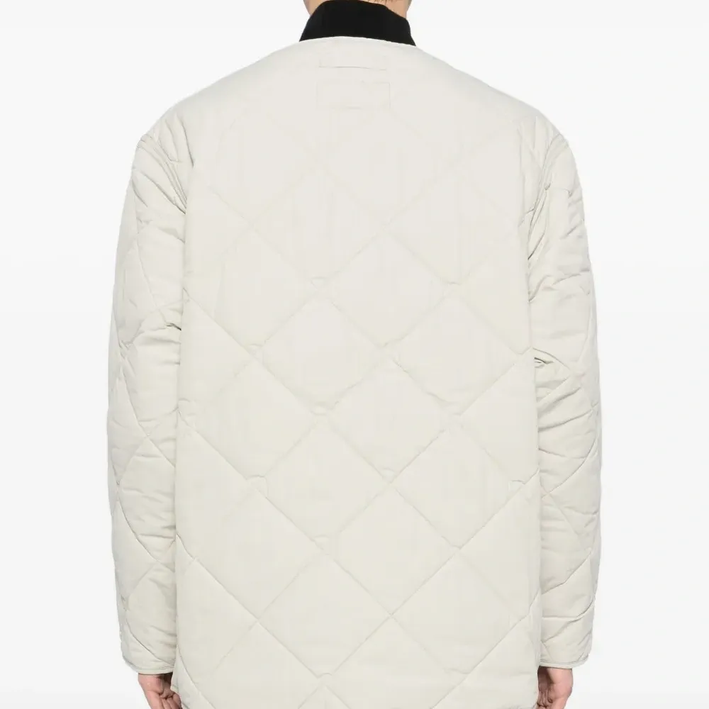 Стеганая куртка из коллаборации с Barbour