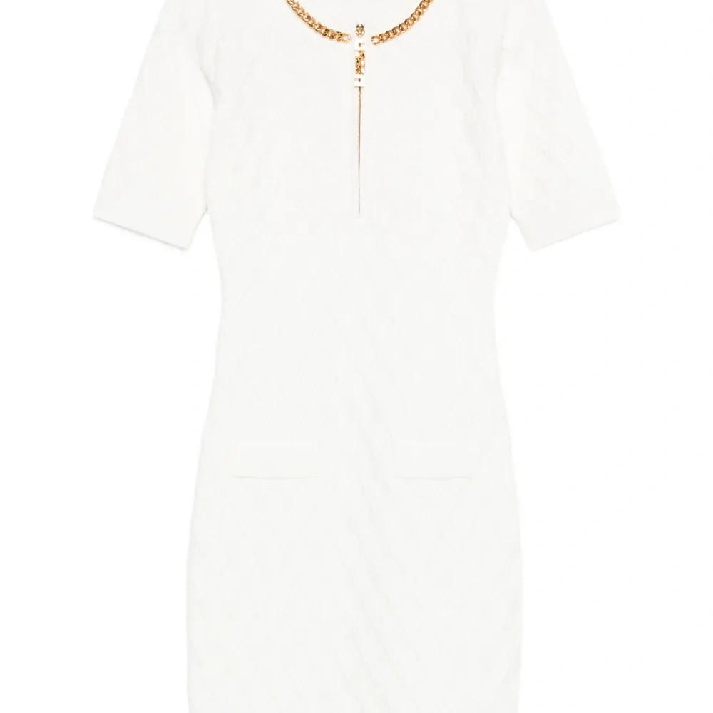 Стеганое платье с цепочкой