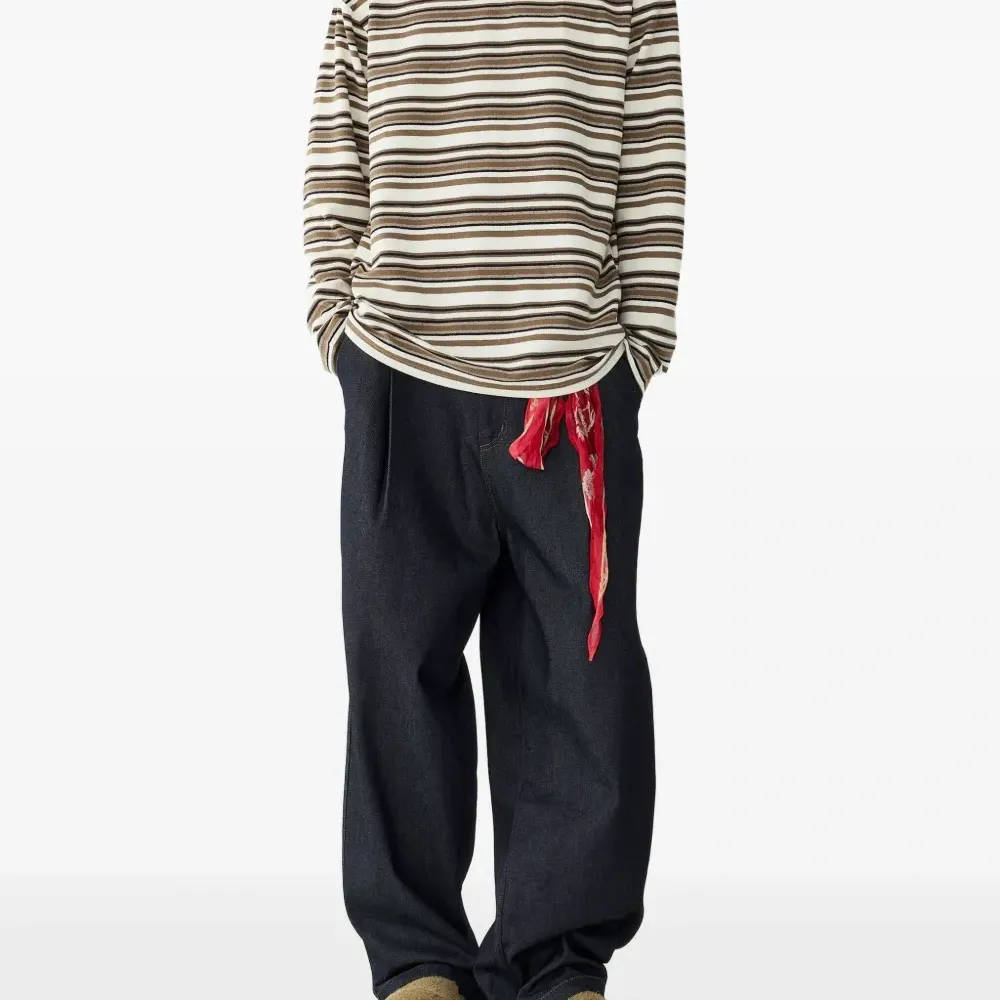 Брюки из джинсовой ткани со складками