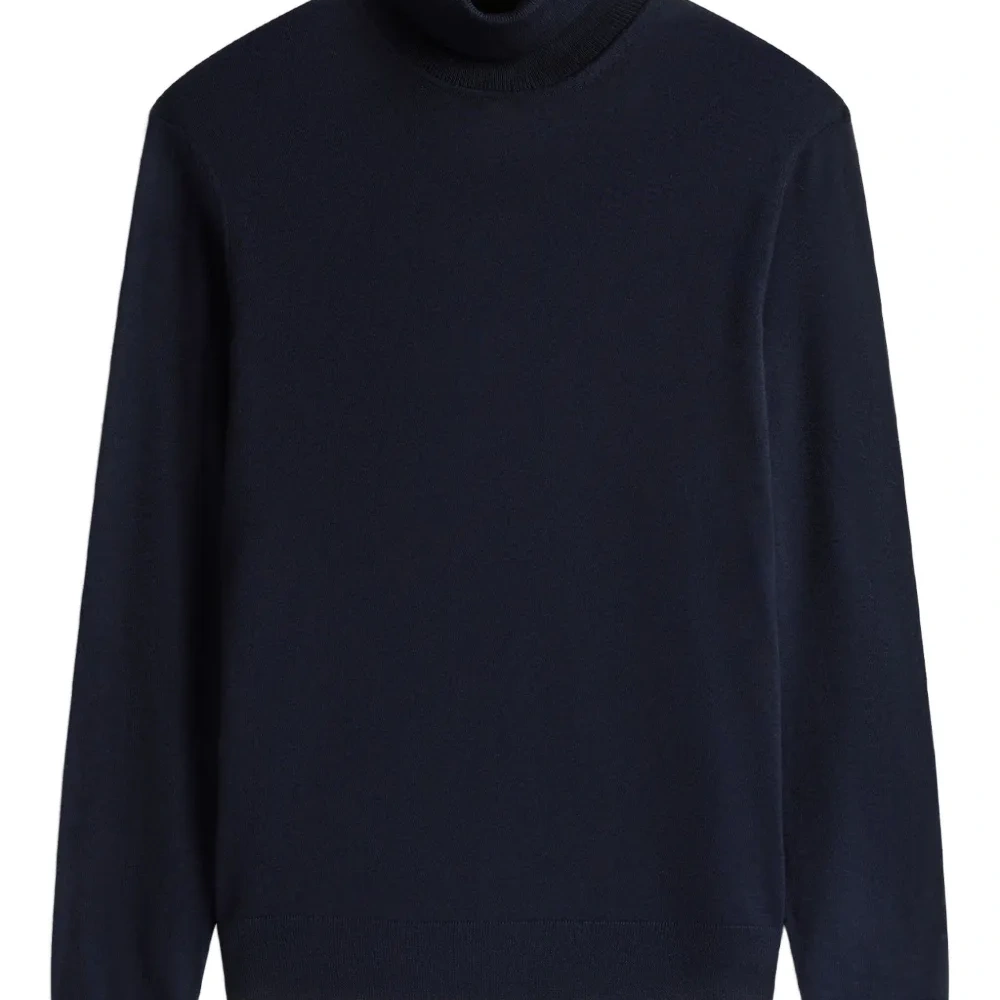 Шерстяной свитер с высоким воротником