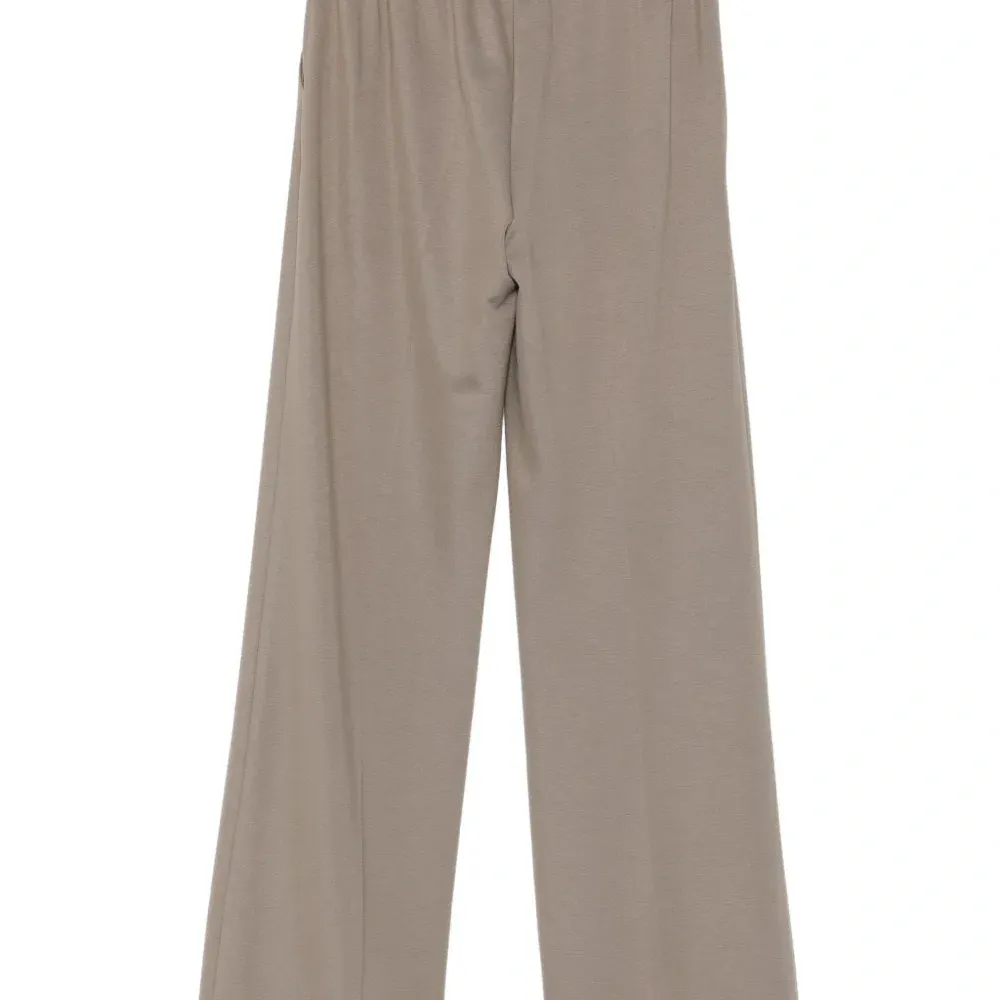 Брюки с подогнутым краем Брюки с подогнутым краем