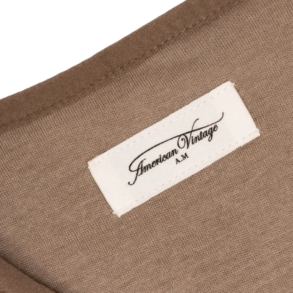 Жилет на пуговицах