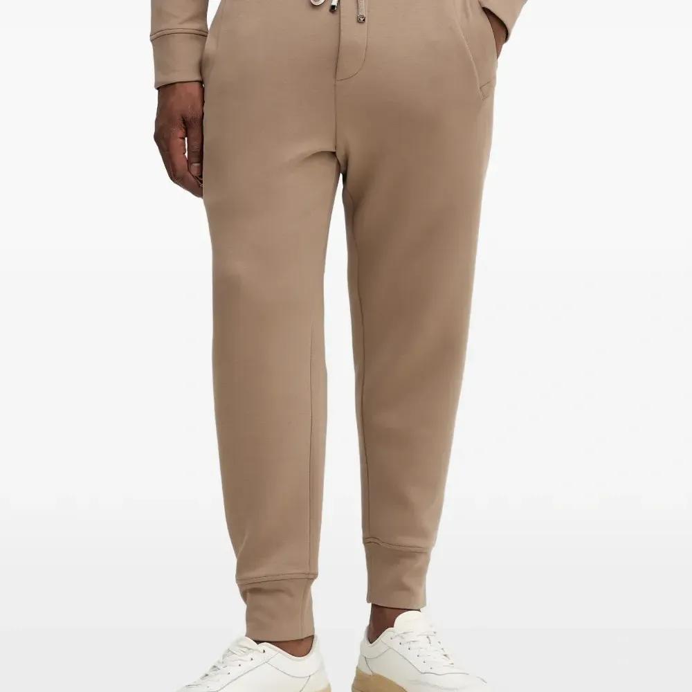 Спортивные брюки на завязках с логотипом Спортивные брюки на завязках с логотипом