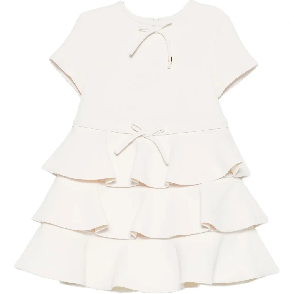 Платье с оборками и украшением в виде банта