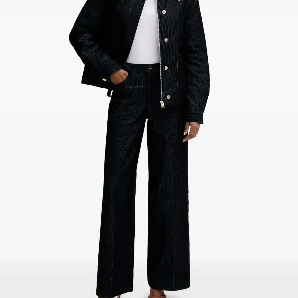 Брюки в полоску Брюки в полоску