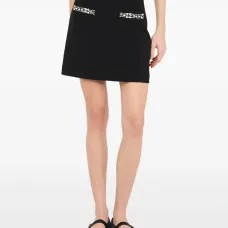 Мини-юбка с карманом, украшенным стразами