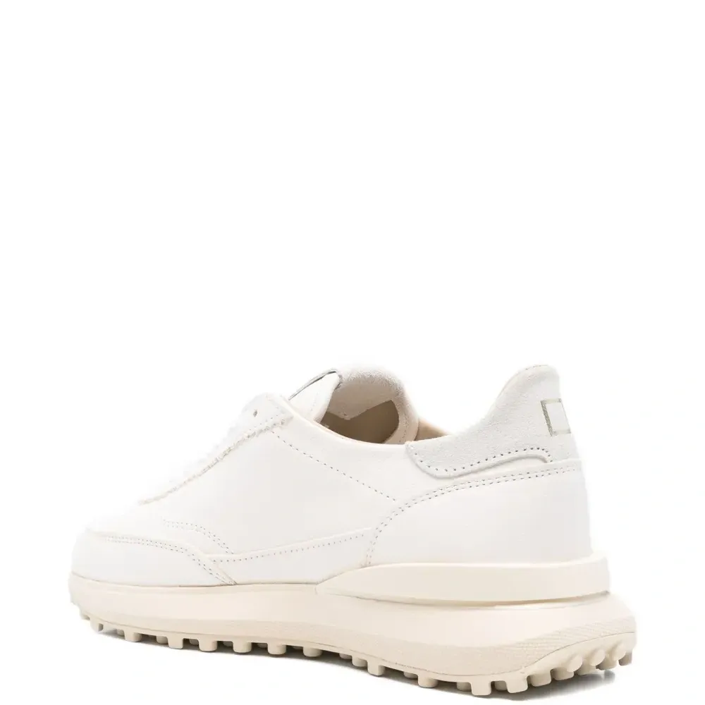 Кожаные низкие кеды на шнуровке