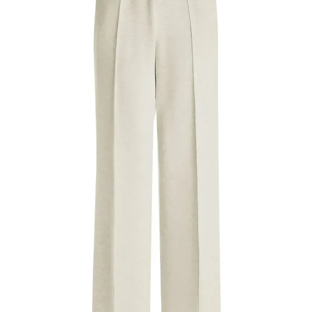 Брюки с широкими штанинами и эластичным поясом Брюки с широкими штанинами и эластичным поясом