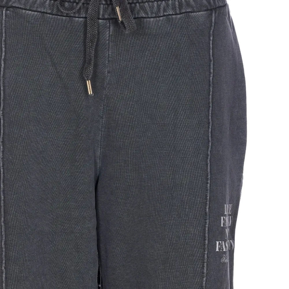 Принтованные спортивные брюки с боковыми швами