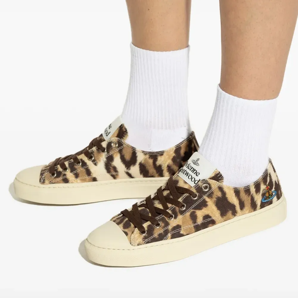 Кроссовки на шнуровке с анималистичным принтом