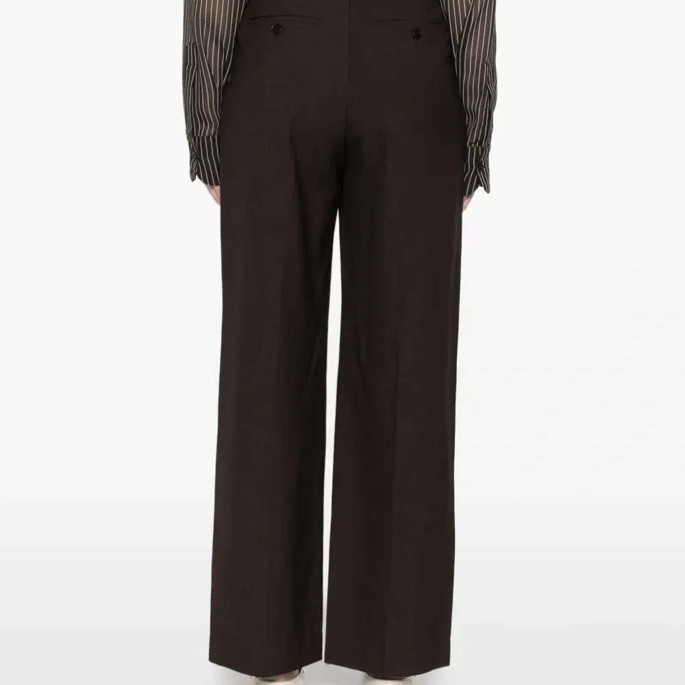 Брюки со складками спереди