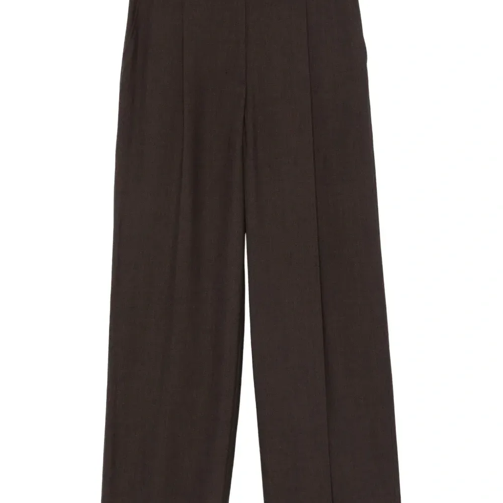 Брюки со складками спереди