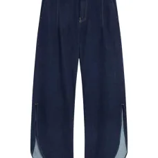 Джинсы с разрезами на подоле Джинсы с разрезами на подоле