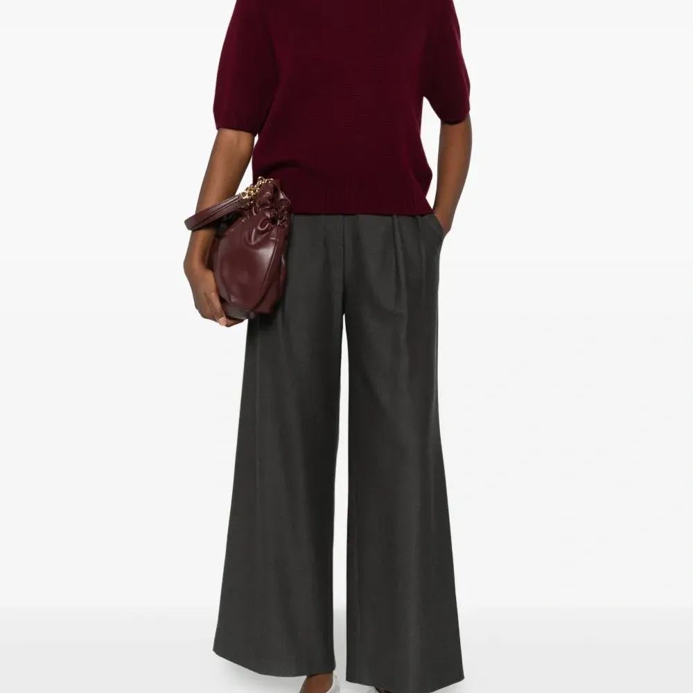 Плиссированные брюки