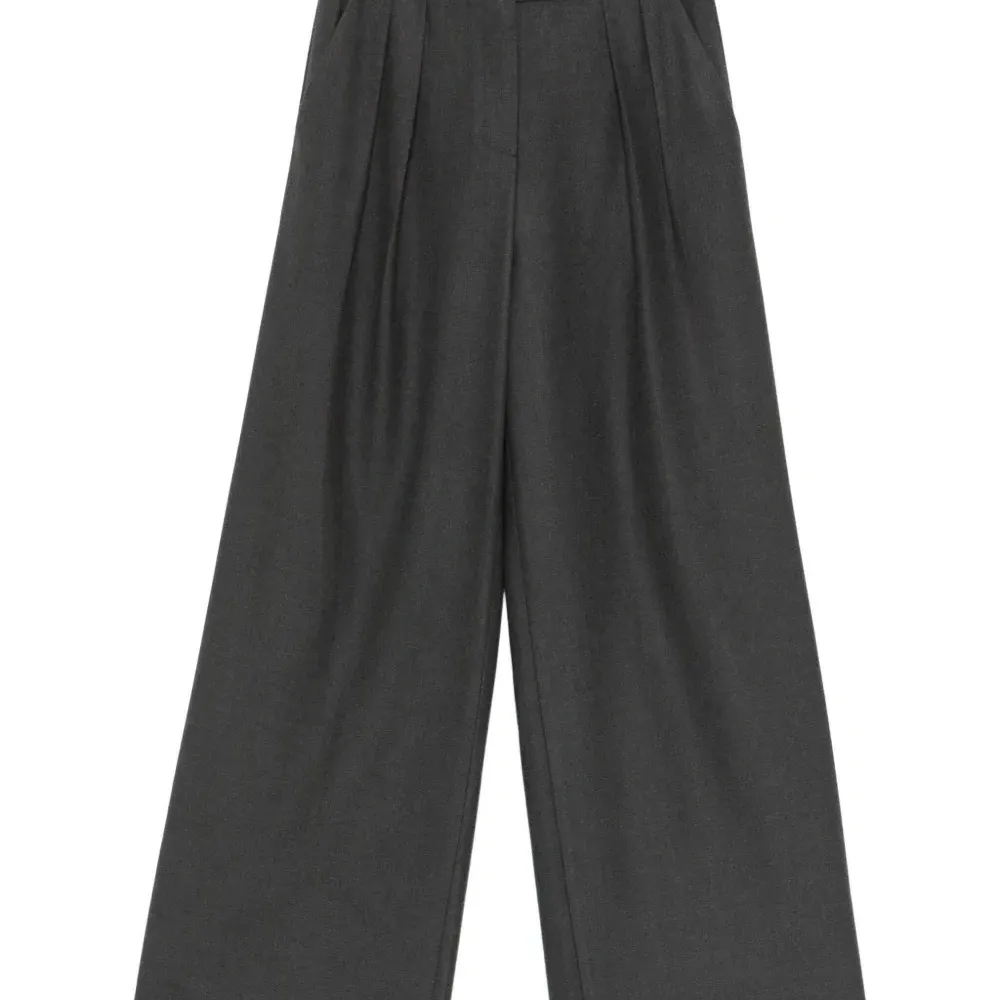 Плиссированные брюки