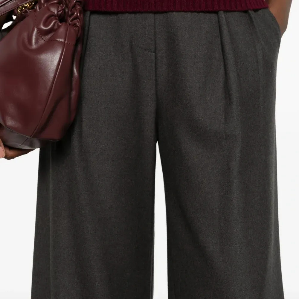 Плиссированные брюки