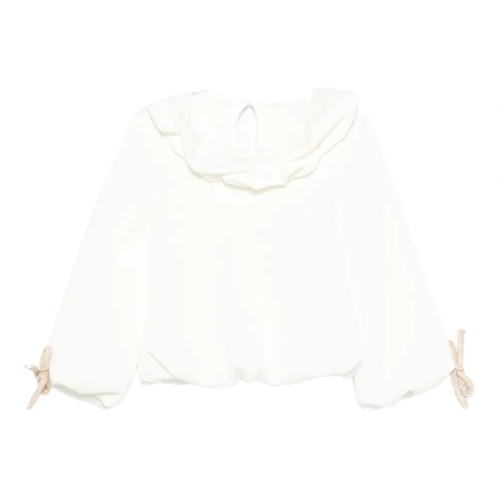 Блузка с оборчатым воротником