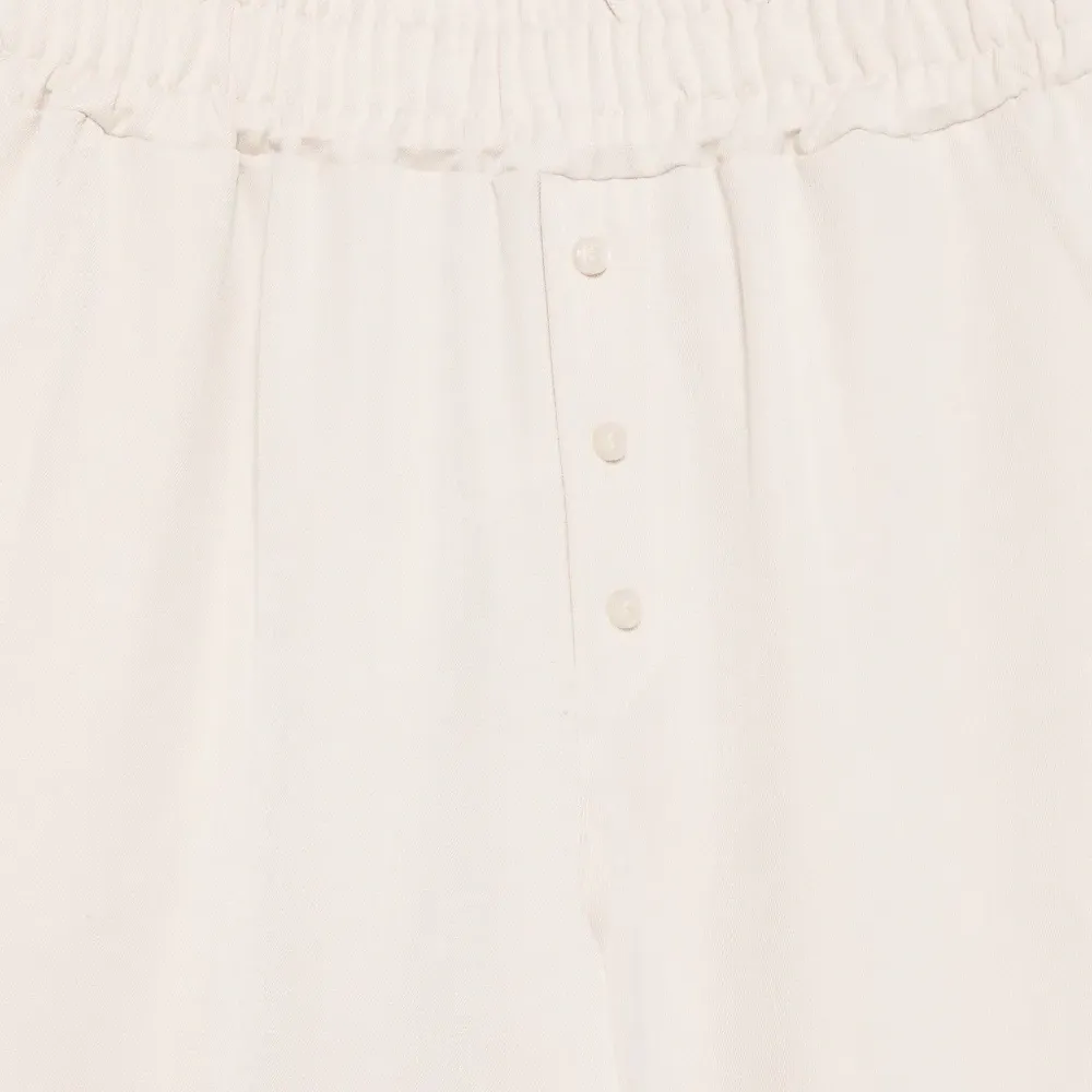 Брюки с эластичным поясом и застёжкой на пуговицы спереди